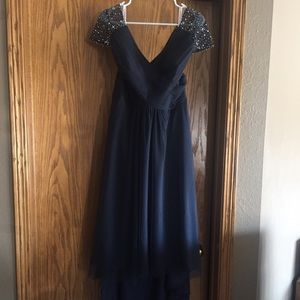 Princess V neck tulle evening gown with beading.